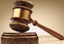 Director Charged