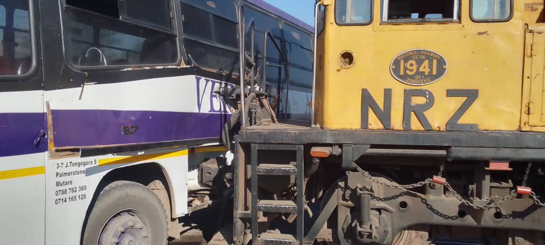 train and bus collide