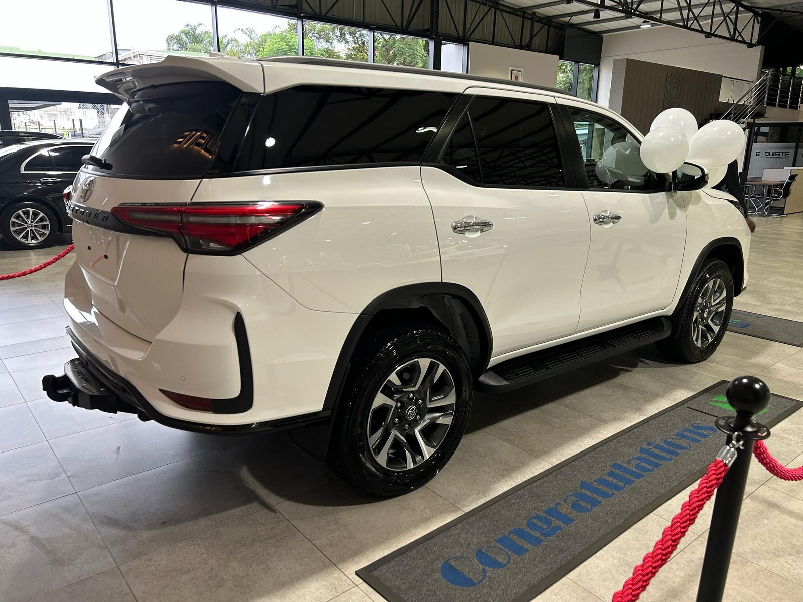 Sir Wicknell Chivayo gifts Dembo family with cars and cash on National Youth Day