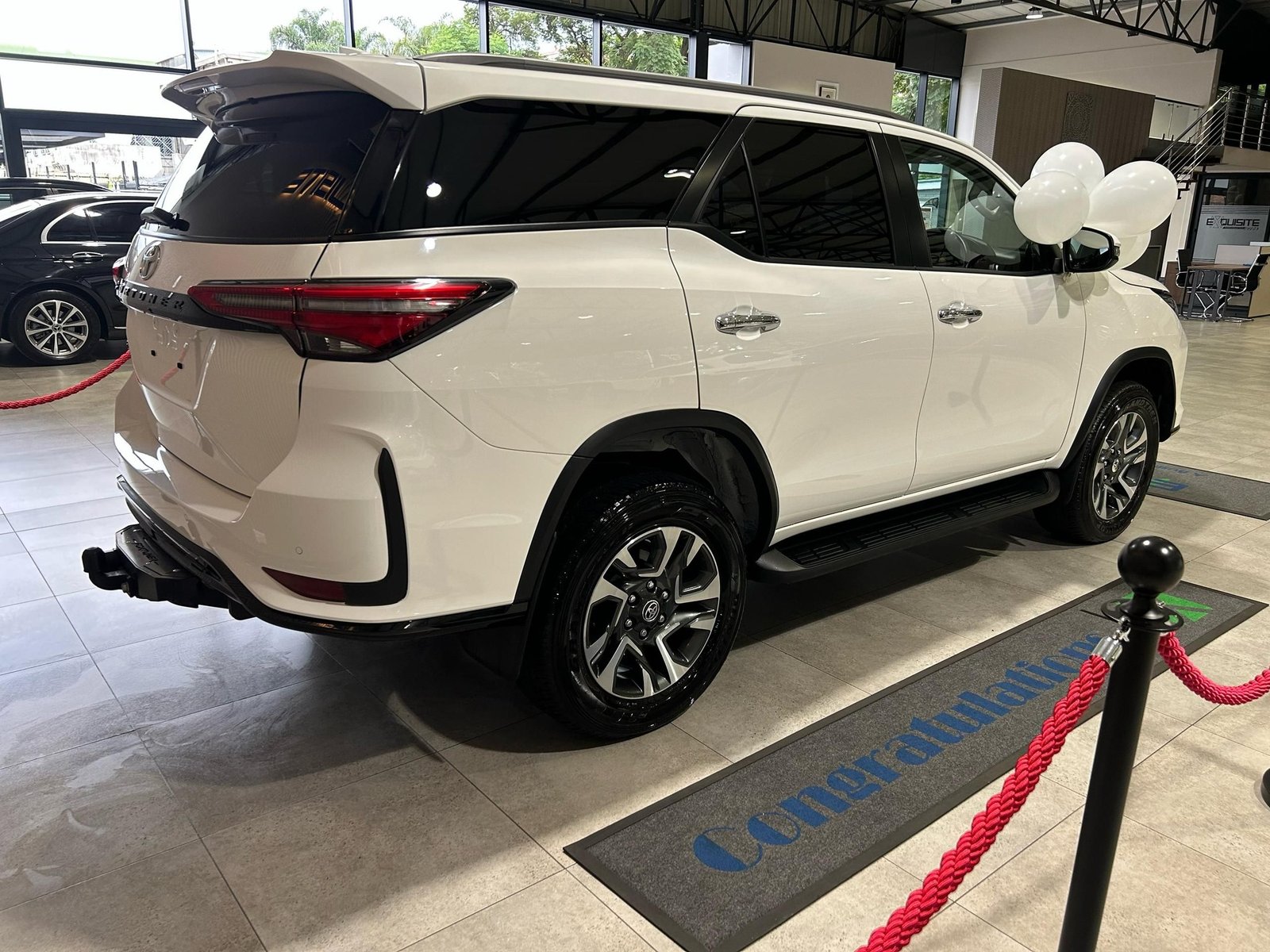 Sir Wicknell Chivayo gifts Dembo family with cars and cash on National Youth Day
