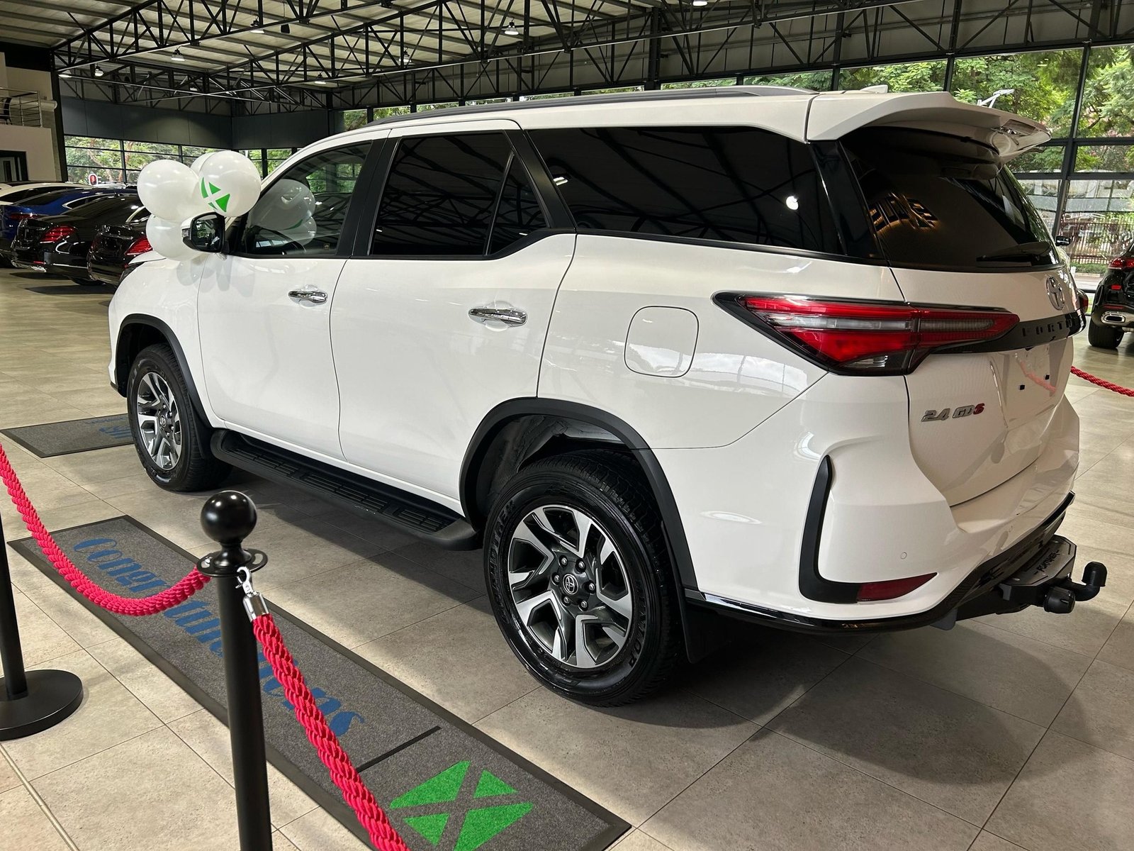 Sir Wicknell Chivayo gifts Dembo family with cars and cash on National Youth Day