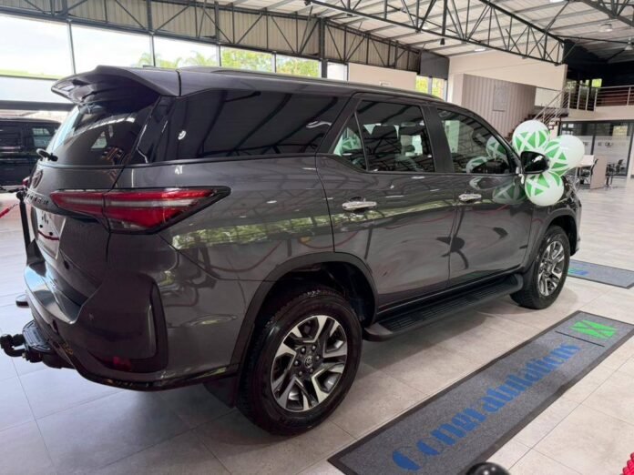 Oscar Pambuka Receives a Toyota Fortuner from Wicknell Chivayo